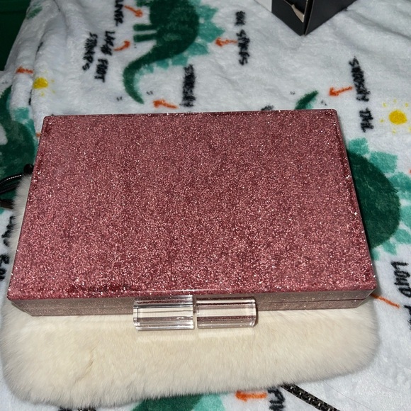Learn More
Gorgeous Charlotte Max Lucite clutch
Purole pink w glitter detail - Picture 5 of 5